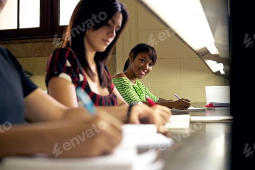 Preview: Portrait Of Happy Female Student Writing African American Woman