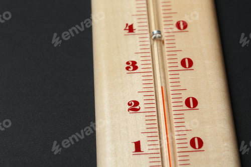Preview: Weather thermometer on dark background, closeup view