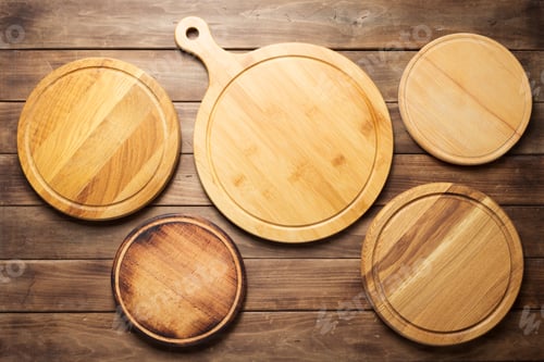 Preview: pizza cutting board at wooden plank table