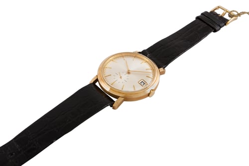 Preview: Closeup shot of a modern black wristwatch on a white background
