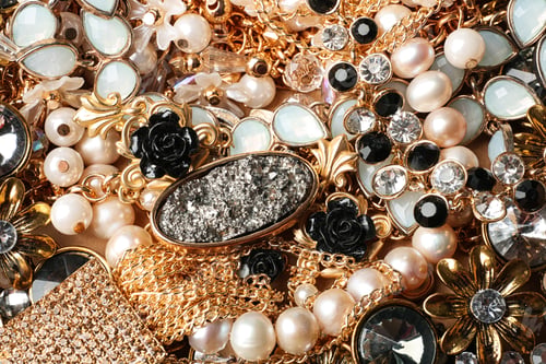 Preview: Different elegant jewelry as background, top view