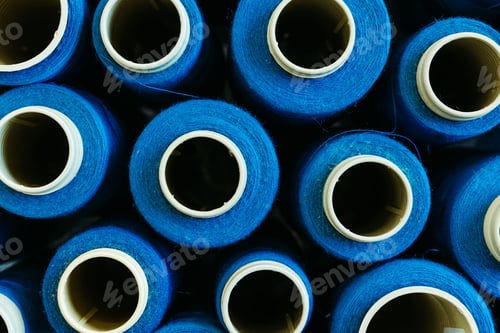 Preview: High-resolution image of a set of spools of blue thread