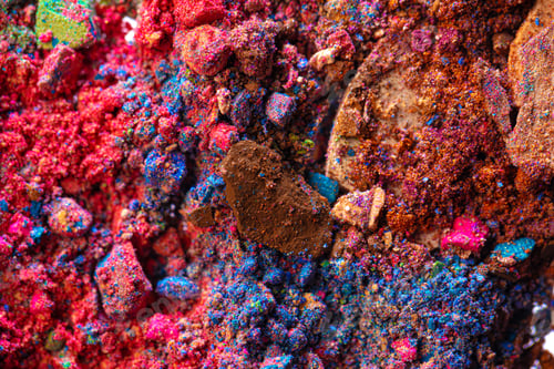 Preview: Background of scattered crashed eye shadows of different colors