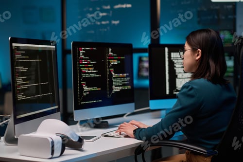 Preview: Female IT Developer Writing Code for VR