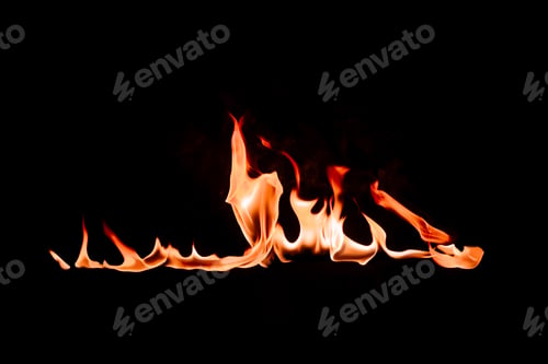 Preview: close up view of burning flame on black backdrop