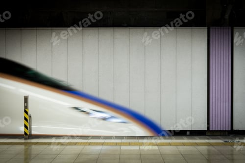 Preview: Family Summer Vacation in Tokyo Japan - bullet train in motion through the station
