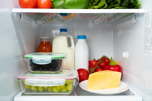 Preview: Open fridge full of fruits, vegetables and drinks
