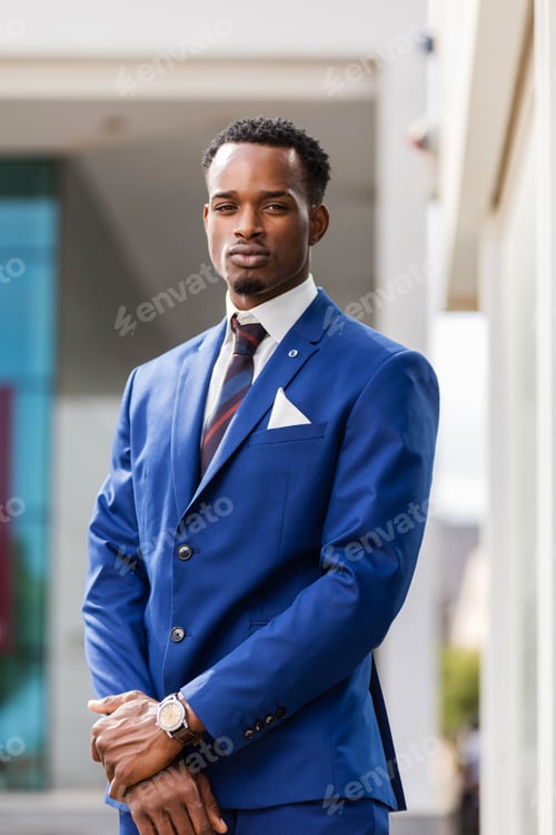 Preview: Outdoor standing portrait of a black African American business m