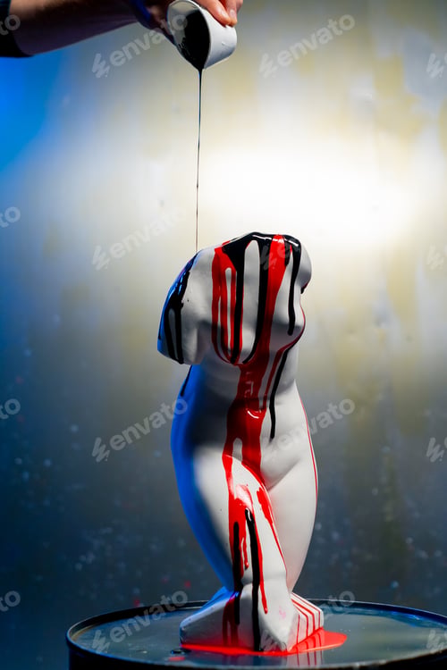 Preview: a white sculpture in the shape of a body stands on a barrel a museum exhibit an artist pours paint
