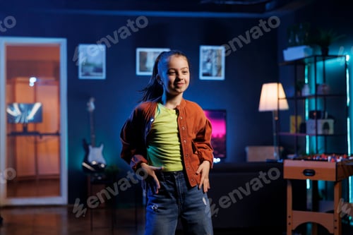Preview: Smiling kid entertaining followers with professional choreography