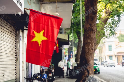Preview: Scenic view of the Vietnamese flag hanging outside of a store