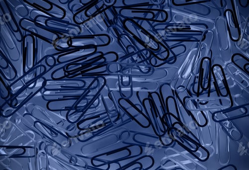 Preview: Paper Clips Office Supplies Lie On A Bright Background