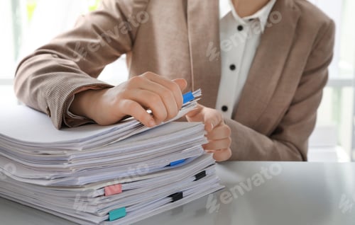 Preview: Woman working with documents in office, closeup