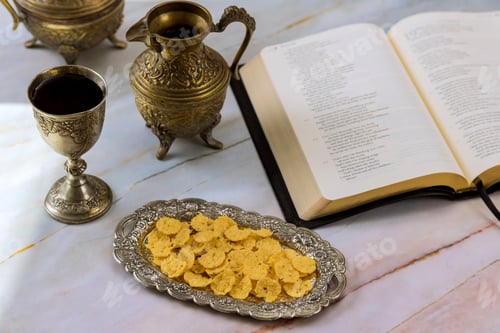 Preview: Christian Holy Communion with unleavened bread chalice of wine symbols of Jesus Christ
