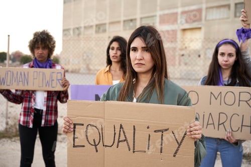 Preview: Group of people leading a group of demonstrators. Female protesting for equality
