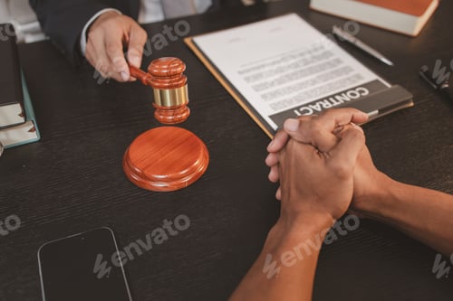 Preview: A professional lawyer discussing legal matters with a client in an office