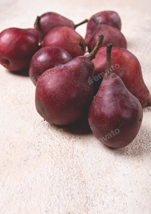 Preview: red pears scattered on the table, barletta pear, selective focus, no people,