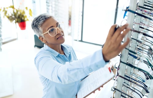 Preview: Stock, optometrist or mature woman with glasses checklist in store for retail inventory or eyewear