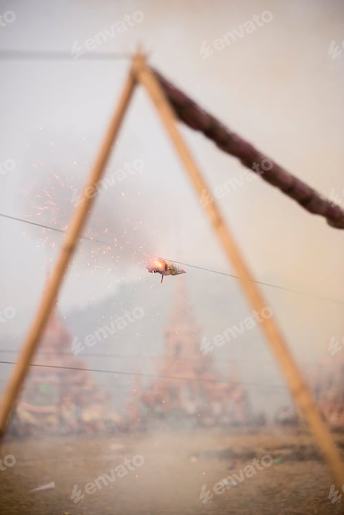 Preview: Mrauk U, firing a rocket at a monks coffin at Dung Bwe Festival, Rakhine State, Myanmar (Burma)