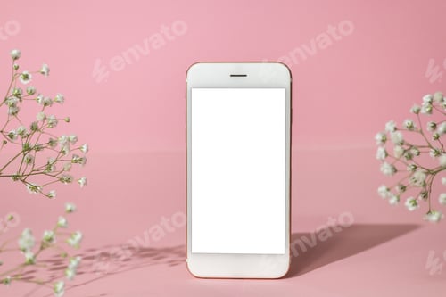 Preview: Mobile phone mock up and white flowers on pink background.Spring pastel colour, hard shadows