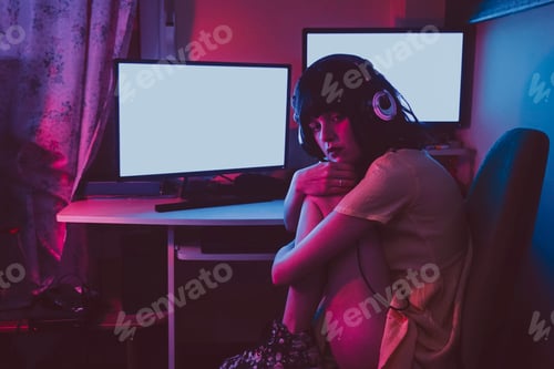 Preview: Young streamer woman working at night from home