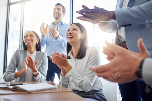 Preview: Shot of a group of businesspeople clapping hands in a meeting at work