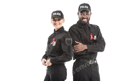 Preview: successful police officers with aids awareness red ribbons looking at camera isolated on white