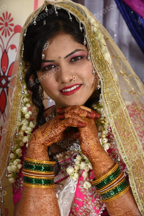 Preview: Indian bride wearing traditional wedding cloths in marriage ceremony.