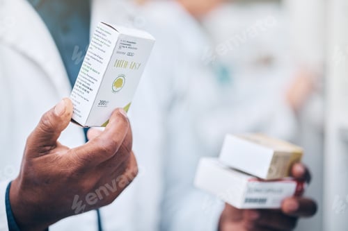 Preview: Pharmacy, black man and hand of pharmacist with medicine boxes. Pills, medication and male medical
