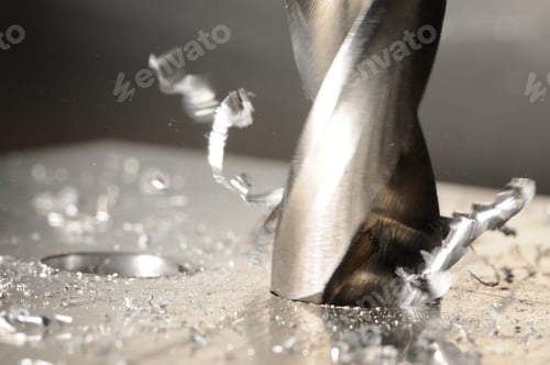 Preview: Close-up of drilling process and metal chips