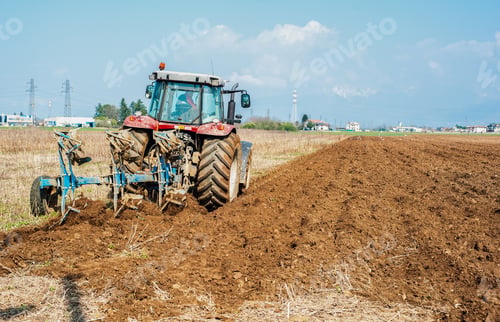 Preview: Tractor plowing the stubble field