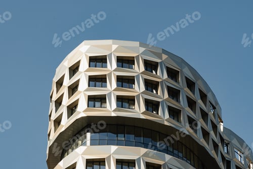 Preview: New building apartment with modern design. Minimal architecture skyscraper against cloudy sky