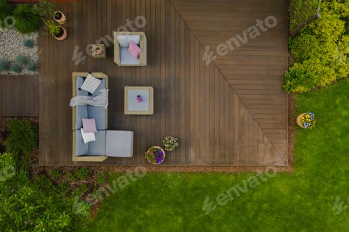 Preview: Top view of wooden terrace with comfortable wicker garden furniture