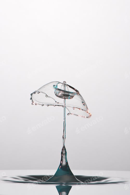 Preview: Splash of colorful liquid with high speed flash