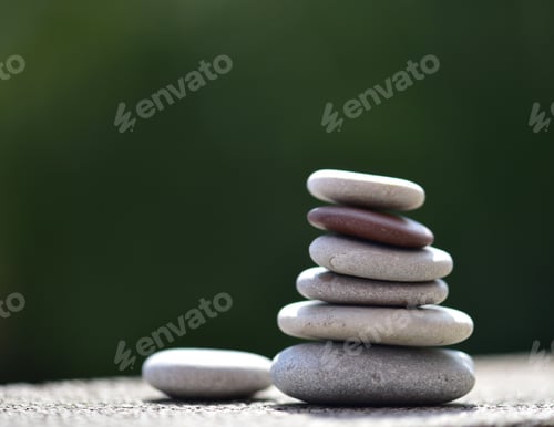 Preview: zen stones on green background