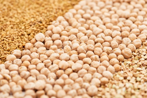 Preview: Close up View of Raw Chickpea Between Assorted Grains