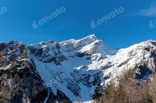 Preview: Scenic view of the snow-capped peak of Mala mojstrovka mountain in the Julian alps, Slovenia