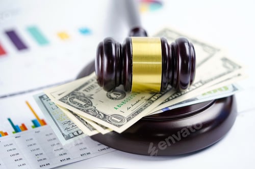 Preview: Judge hammer on US dollar banknotes background.
