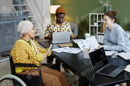 Preview: Diverse Coworkers in Meeting