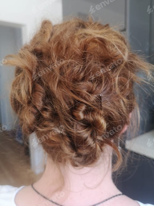 Preview: Woman with Beautiful Hairstyle in Neutral Setting