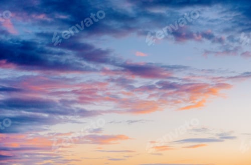 Preview: Fantastic views of the blue pink sunset with cumulus clouds.