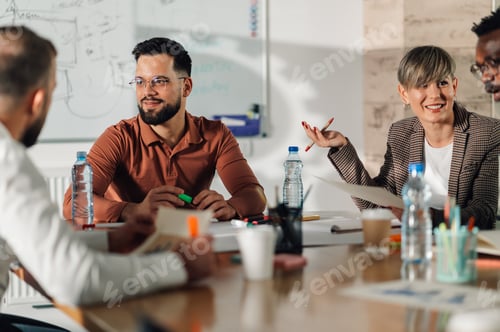 Preview: Business people collaborating during meeting in office boardroom