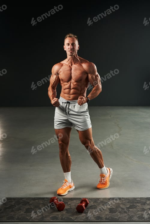 Preview: Muscular Adult Man Posing in Training Studio