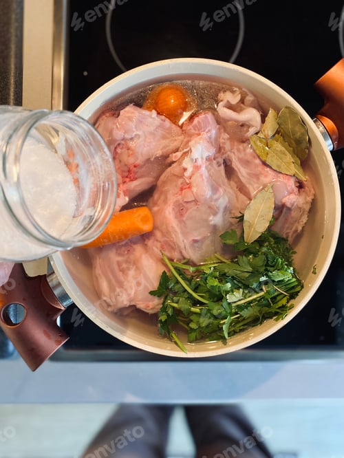 Preview: Raw Chicken Soup Ingredients in a Cooking Pot