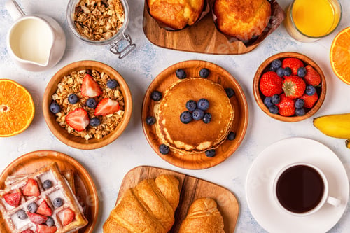 Preview: Delicious breakfast on a light table.
