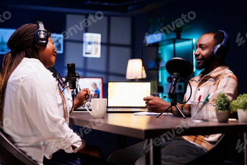Preview: Man and woman doing a talk show at home