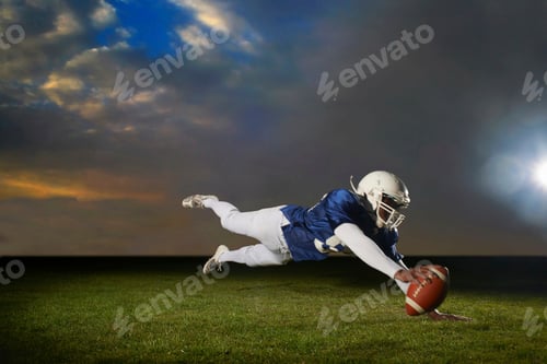 Preview: American football player reaching for touch down