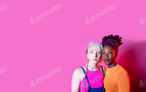 Preview: Isolated caucasian and black woman posing together for inclusion and tolerance