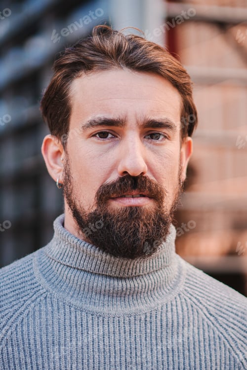 Preview: Vertical close up portrait of young caucasian man isolated outdoors. Photoshot of real emotions of