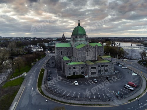 Preview: Aerial view of Galway Cathedral in Galway, Ireland in cloudy sky background